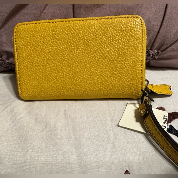 Brand new Anne Klein small wristlet w/ tags in a bright yellow color. - Picture 2 of 4